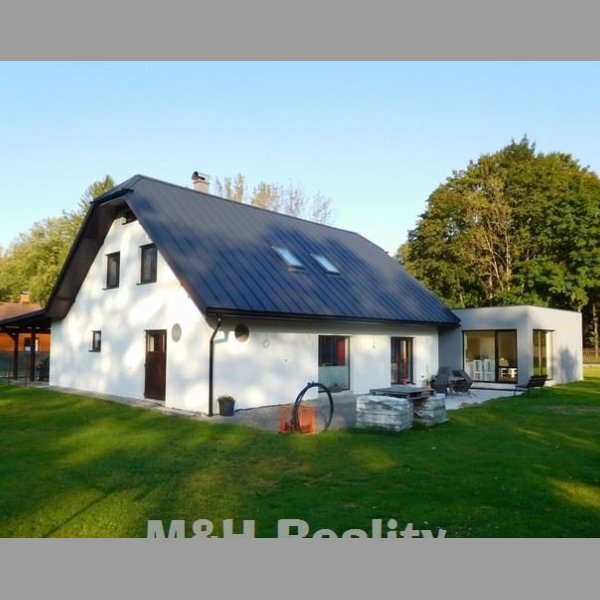 Prodej rodinného domu 7+ 2kk s garáží v obci Raškovice